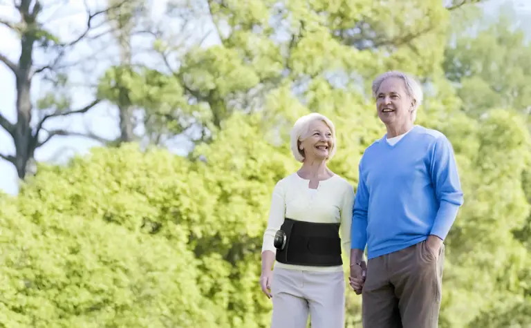Old couple taking a walk